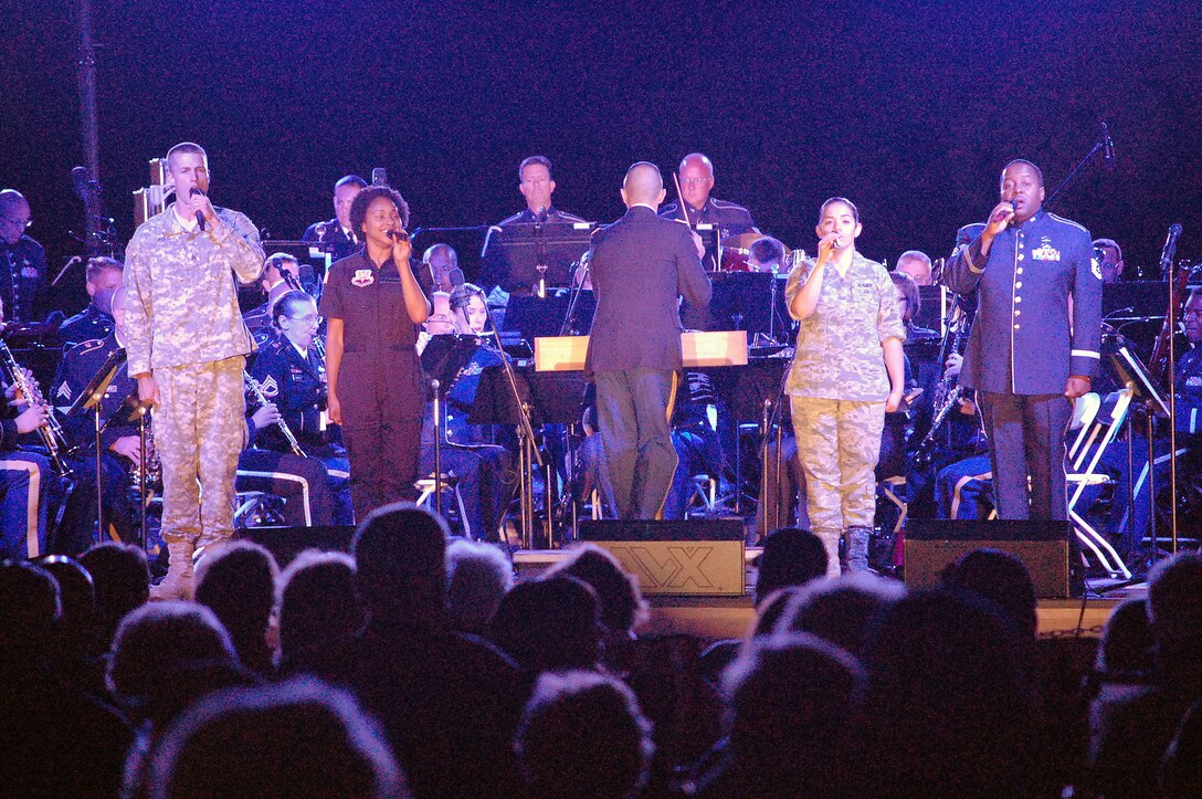 Singers from the USAF Heritage of America Band and the US Army Training and Doctrine Command Bands perform the Armed Services Medley for a wonderful crowd at the Constitution Day Concert in Williamsburg, VA this past Tuesday, 17 September 2013