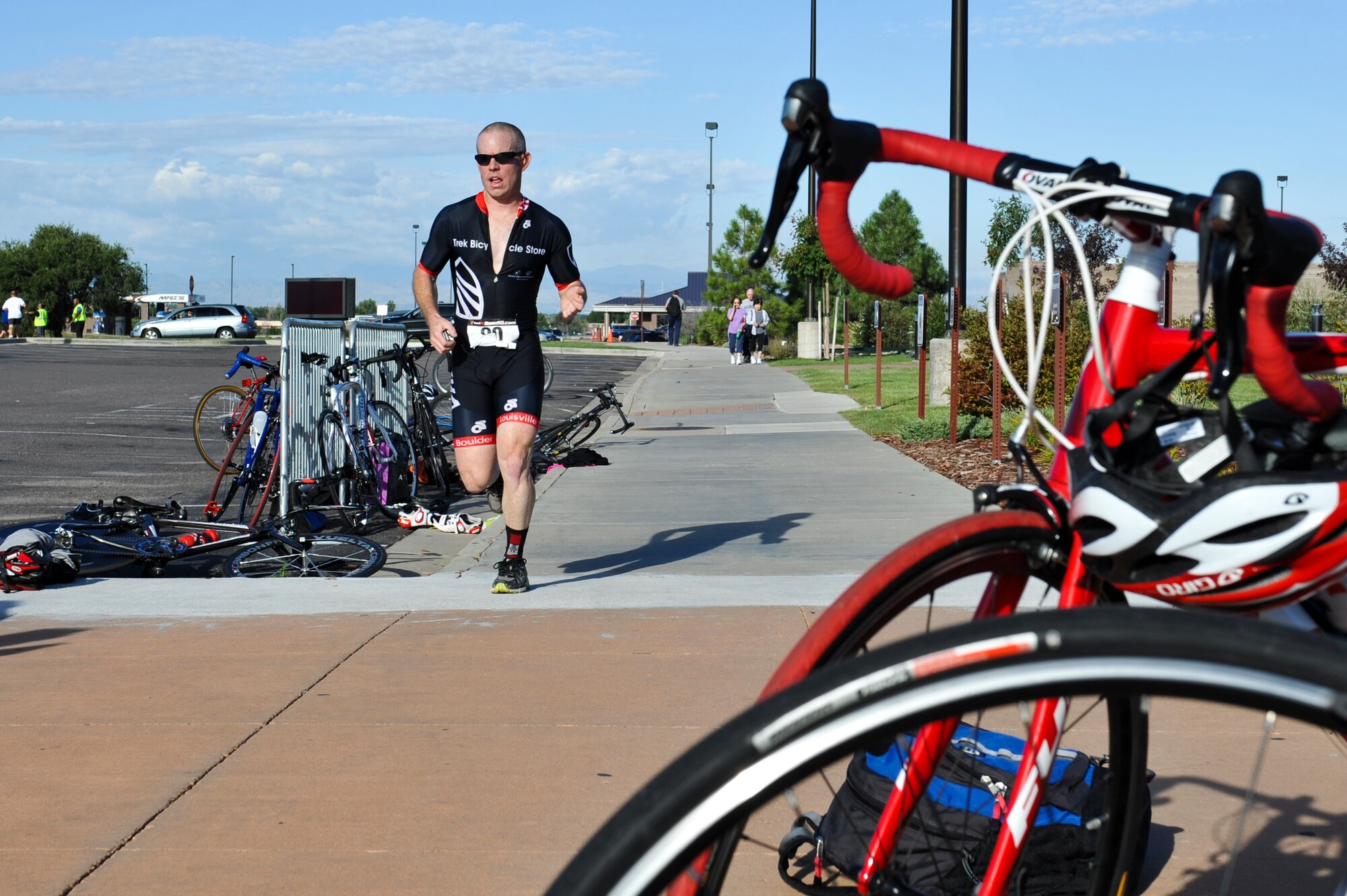 Leslie Handy, 460th Medical Group, sprints to the finish of the 2nd Annual Buckley Duathlon Sept. 19, 2013, on Buckley Air Force Base, Colo. The race started with a 2-mile run, followed by a 6-mile bike ride and finished with a 1.5-mile run. (U.S. Air Force photo by Airman 1st Class Riley Johnson/Released)