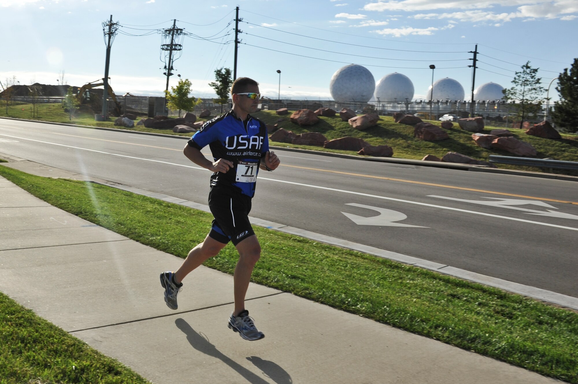 Francois Roy, 2nd Space Warning Squadron, starts the last portion of the 2nd Annual Buckley Duathlon Sept. 19, 2013, on Buckley Air Force Base, Colo. The race started with a 2-mile run, followed by a 6-mile bike ride and finished with a 1.5-mile run. (U.S. Air Force photo by Airman 1st Class Riley Johnson/Released)
