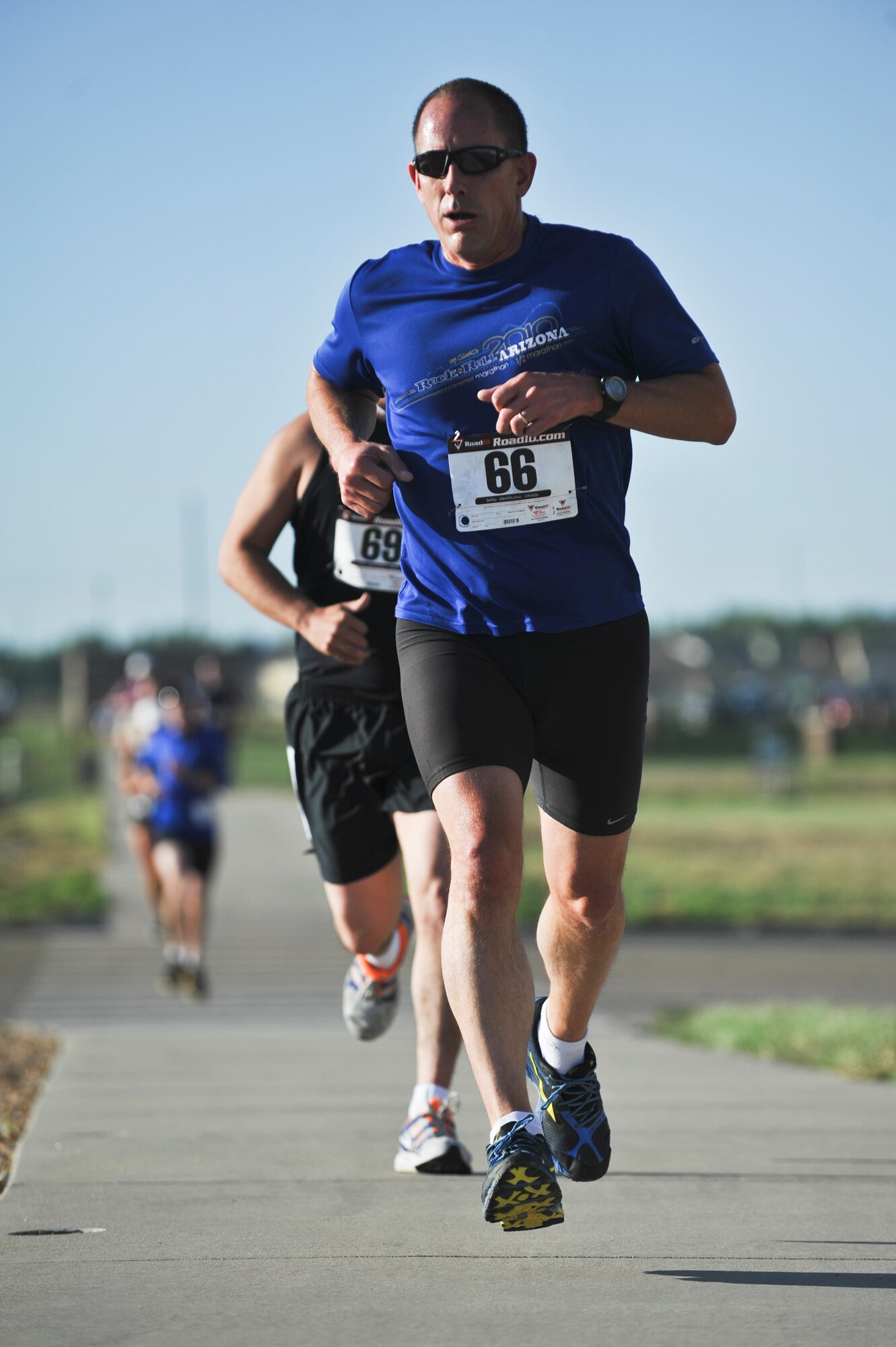 Mark Meyer runs first leg of the 2nd Annual Buckley Duathlon Sept. 19, 2013, on Buckley Air Force Base, Colo. The race started with a 2-mile run, followed by a 6-mile bike ride and finished with a 1.5-mile run. (U.S. Air Force photo by Airman 1st Class Riley Johnson/Released)