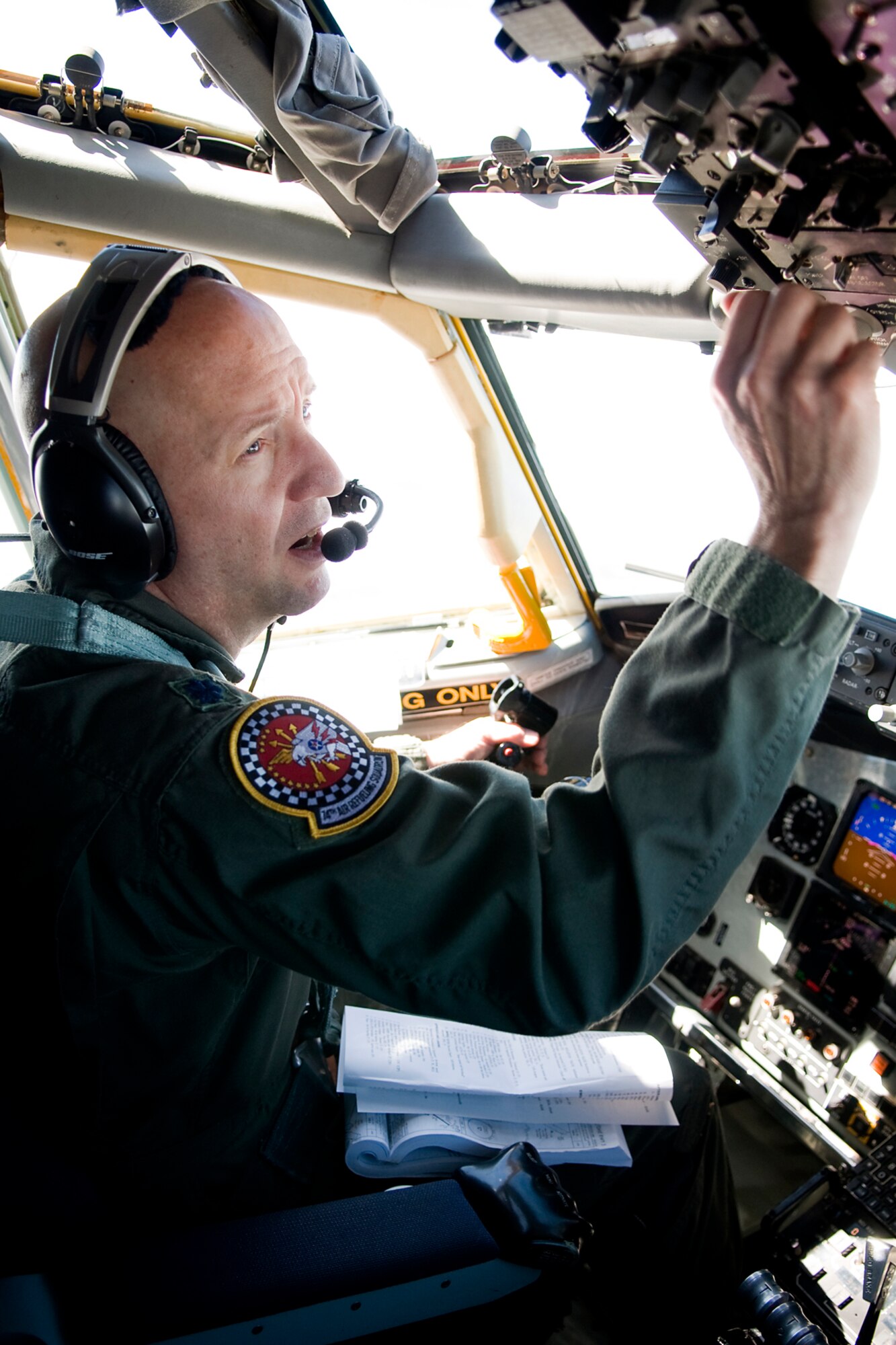 Lt. Col. Brian Stopher, 74th Air Refueling Squadron commander, flies a KC-135R Stratotanker during an in-flight refueling mission over southern Indiana Sept. 13, 2013. Stopher and the KC-135 crew refueled two French Air Force Mirage 2000Ds as part of Bold Quest 13.2, a coalition capability demonstration and assessment exercise, which fosters resource pooling, collaborative data collection and analysis to inform capability development. (U.S. Air Force photo/Tech. Sgt. Mark R. W. Orders-Woempner) 
