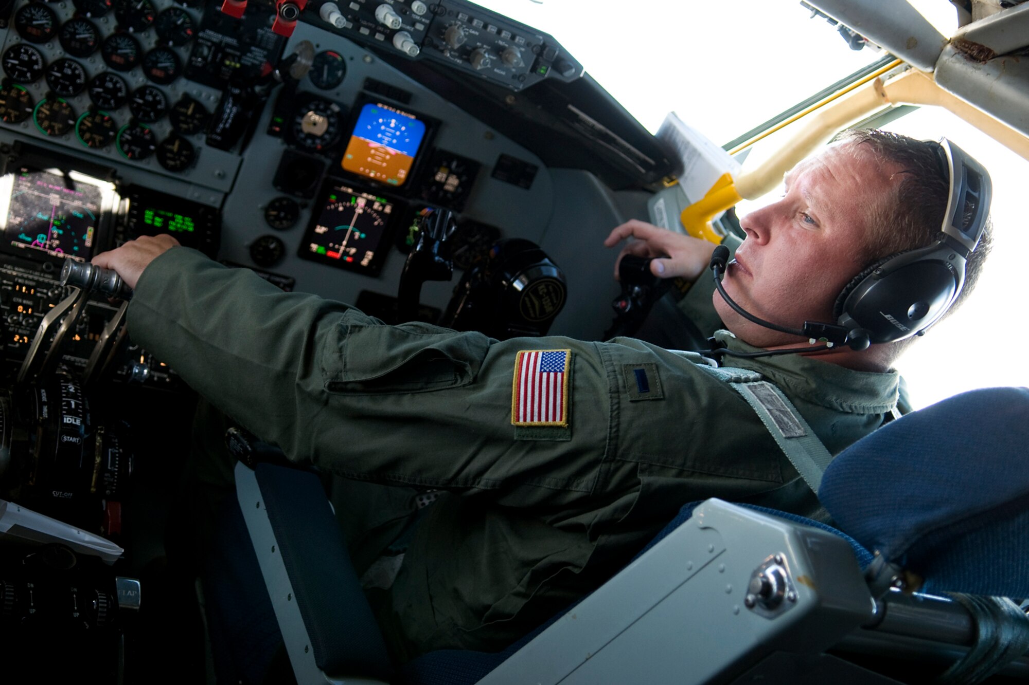 1st Lt. Jason Bireley, 72nd Air Refueling Squadron pilot, operates the controls of a KC-135R Stratotanker from Grissom Air Reserve Base, Ind., during an in-flight refueling mission over southern Indiana Sept. 13, 2013. Bireley and the KC-135 crew refueled two French Air Force Mirage 2000Ds as part of Bold Quest 13.2, a coalition capability demonstration and assessment exercise, which fosters resource pooling, collaborative data collection and analysis to inform capability development. (U.S. Air Force photo/Tech. Sgt. Mark R. W. Orders-Woempner) 
