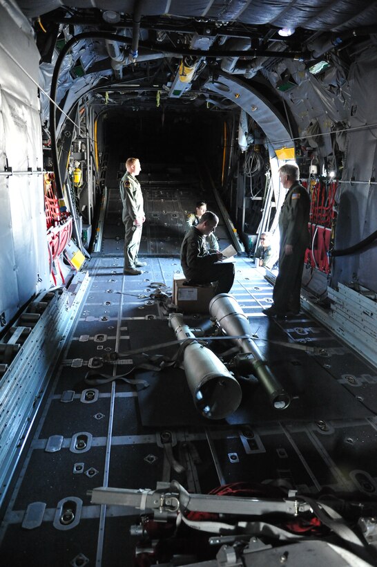Crew members prepare for the final flight of the last of the 550th Special Operations Squadron's assigned MC-130Ps Combat Shadows at an informal ceremony Sept. 6.  The departure of the aircraft marks the end of a 25-year training curriculum at Kirtland. (Photo by Ken Moore)
