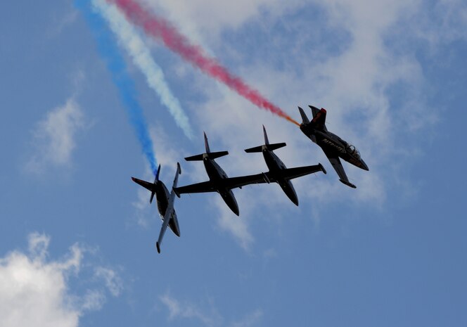The Patriots Jet Demonstration Team perform during the National Championship Air Races at Stead Airport, Reno, Nev., Sept. 14, 2013. The Patriots are civilian-owned jet aerobatic team. (U.S. Air Force photo by Staff Sgt. Robert M. Trujillo/Released) 