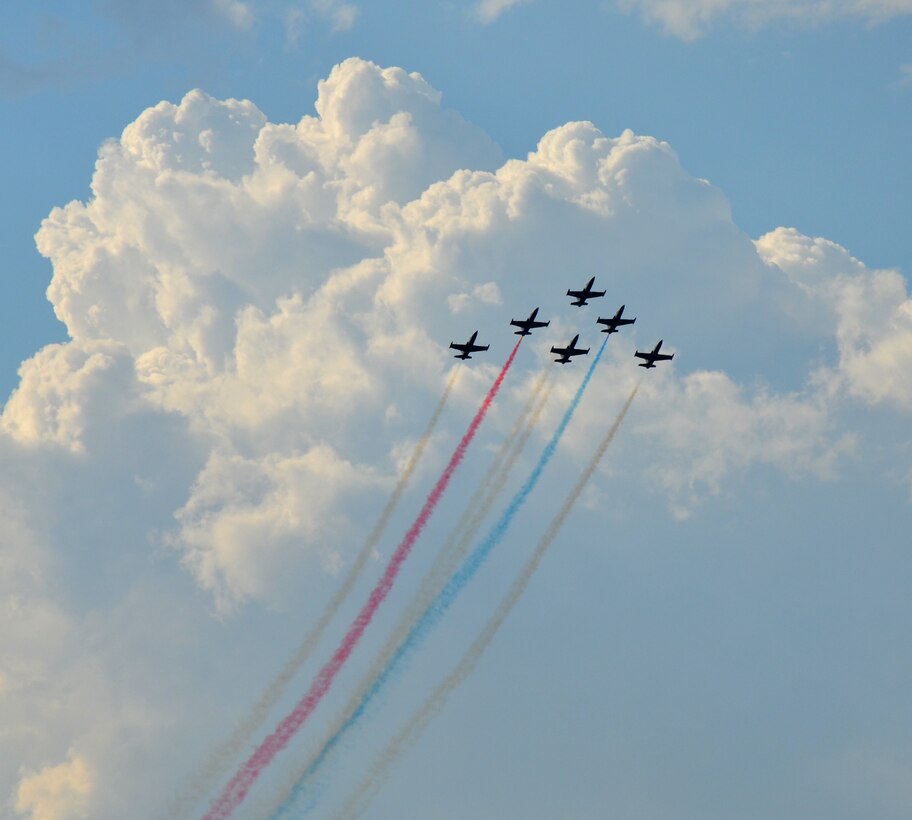 L-39 Albatrosses from the Patriots Jet Demonstration Team perform during the National Championship Air Races at Stead Airport, Reno, Nev., Sept. 14, 2013. The Patriots are a civilian-owned jet aerobatic team. (U.S. Air Force photo by Staff Sgt. Robert M. Trujillo) 