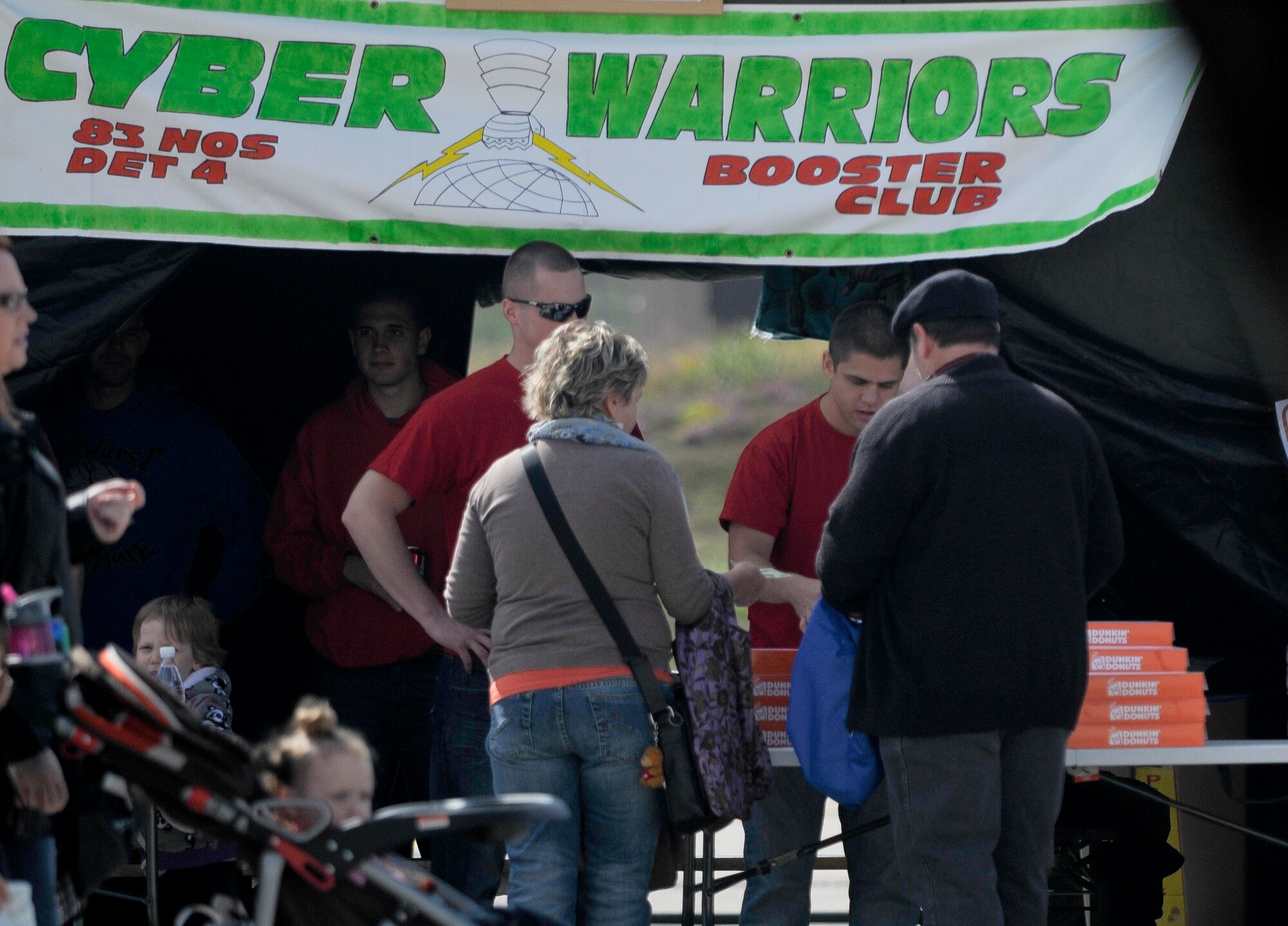 Guests interact with vendors during the Ramstein Welfare Bazaar, Sept. 13, 2013, Ramstein Air Base, Germany. Private organizations were invited to sell food and raise money for their organizations. (U.S. Air Force photo/Senior Airman Jose L. Leon)