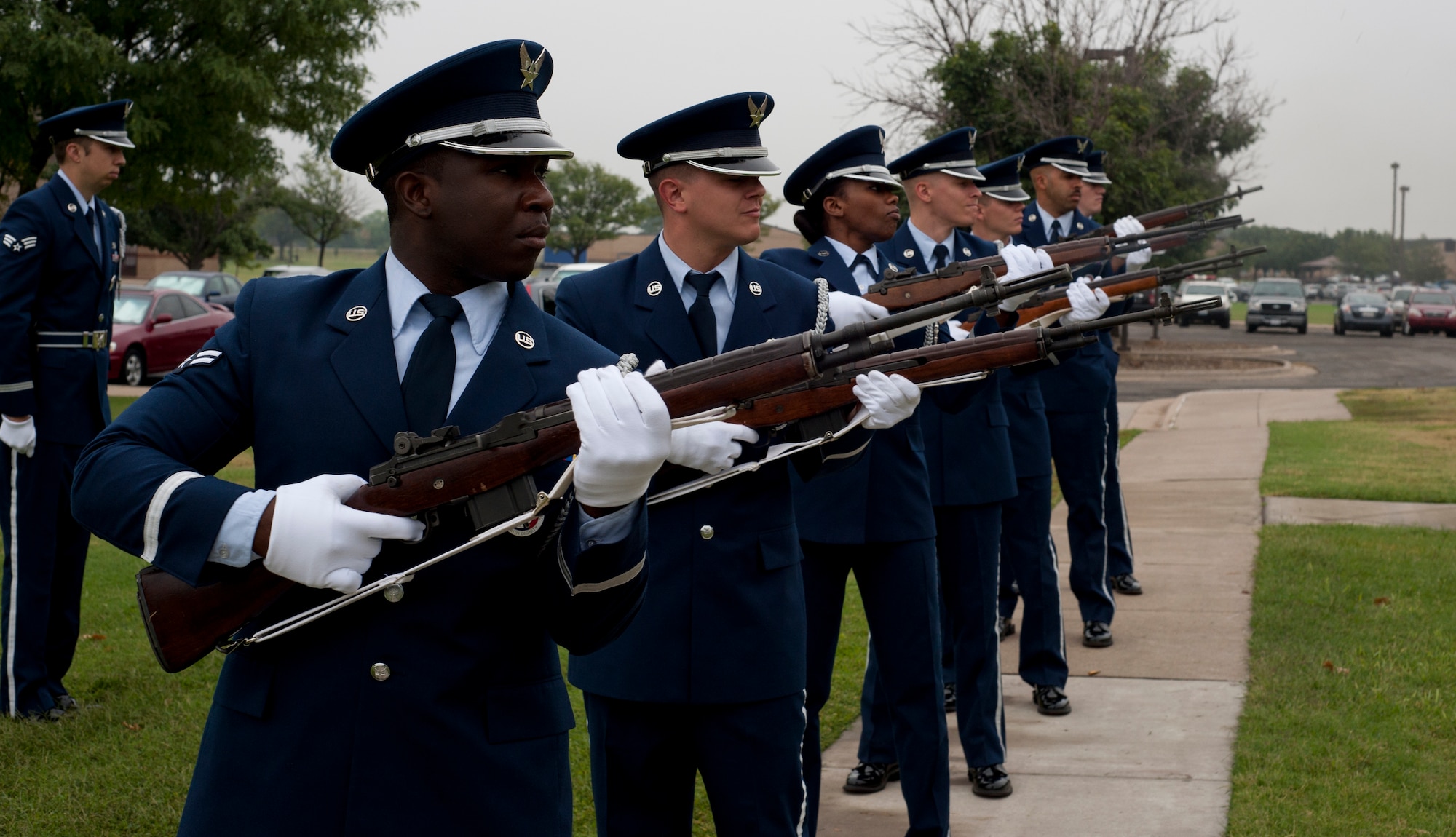 Airmen from the 22nd Air Refueling Wing Honor Guard render a 21-gun salute Sept. 16, McConnell Air Force Base, Kan. The Airmen were marking the end of a memorial held for deceased service members. (U.S. Air Force photo/Airman 1st Class Victor J. Caputo)