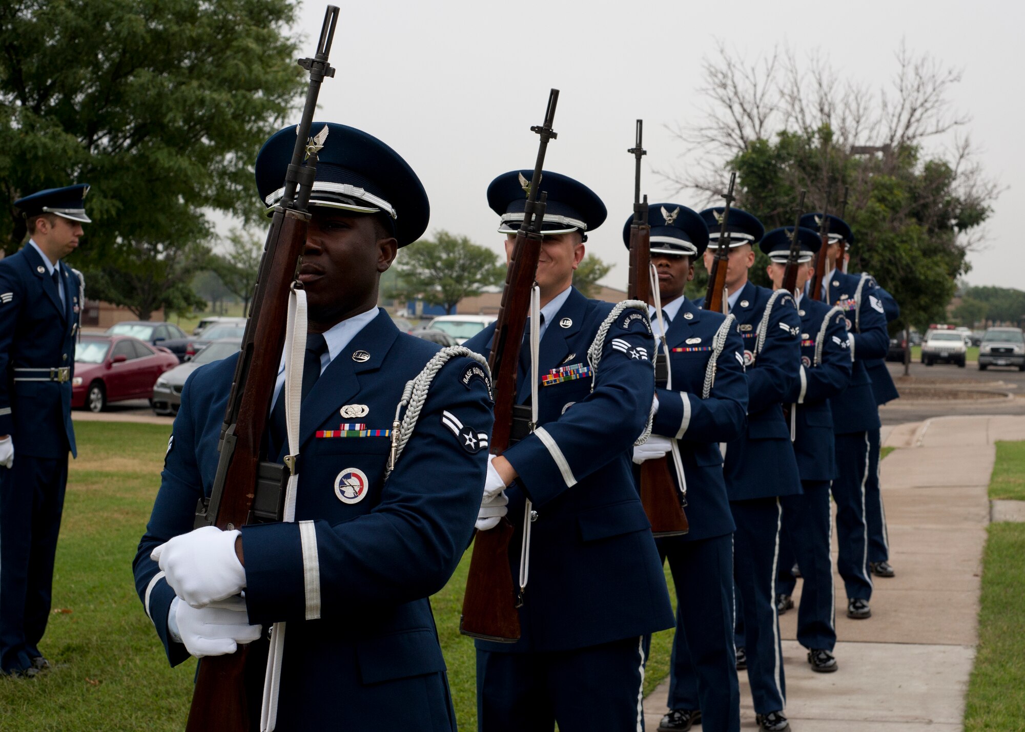 Airmen from the 22nd Air Refueling Wing Honor Guard prepare to render a 21-gun salute Sept. 16, 2013, at McConnell Air Force Base, Kan. This ceremony is practiced until it can be flawlessly performed. (U.S. Air Force photo/Airman 1st Class Victor J. Caputo)