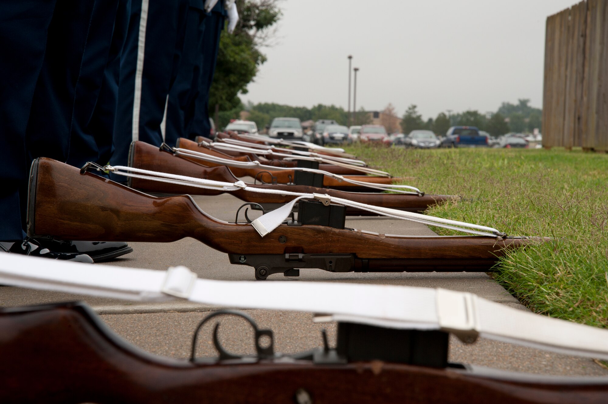 M14 rifles line the ground in front Airmen from the 22nd Air Refueling Wing Honor Guard Sept. 16, 2013, at McConnell Air Force Base, Kan. The rifles are used for a variety of details, including 21-gun salutes. (U.S. Air Force photo/Airman 1st Class Victor J. Caputo)