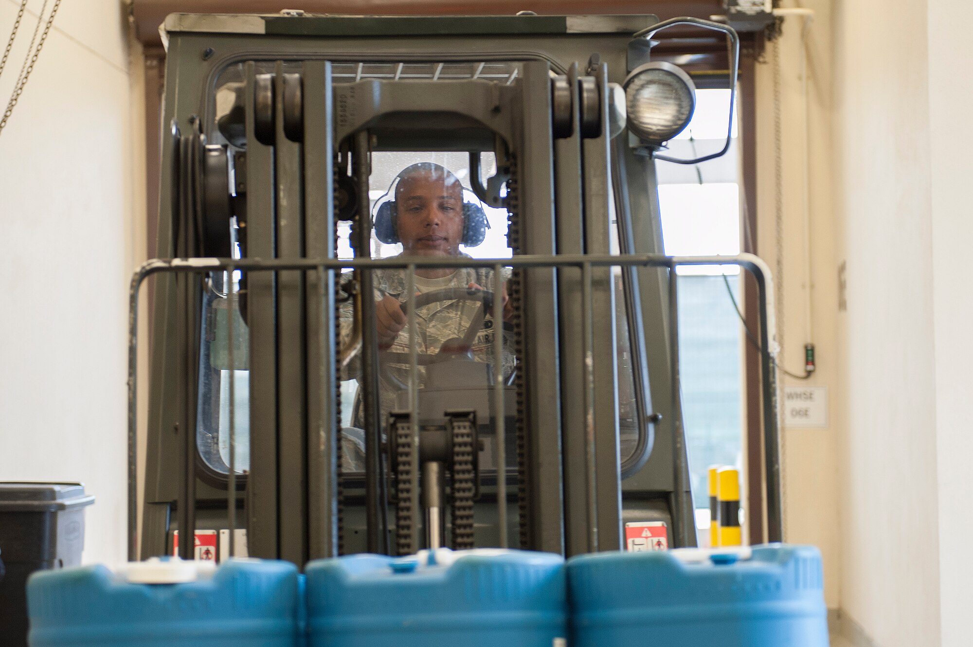 Airman 1st Class Lorenzo Lucas, 39th Logistics Readiness Squadron hazardous materials journeyman, drives a forklift Sept. 18, 2013, at Incirlik Air Base, Turkey. Lucas along with other HAZMAT Airmen, are responsible for maintaining and issuing hazardous materials at Incirlik AB. (U.S. Air Force photo by Airman 1st Class Nicole Sikorski/Released)