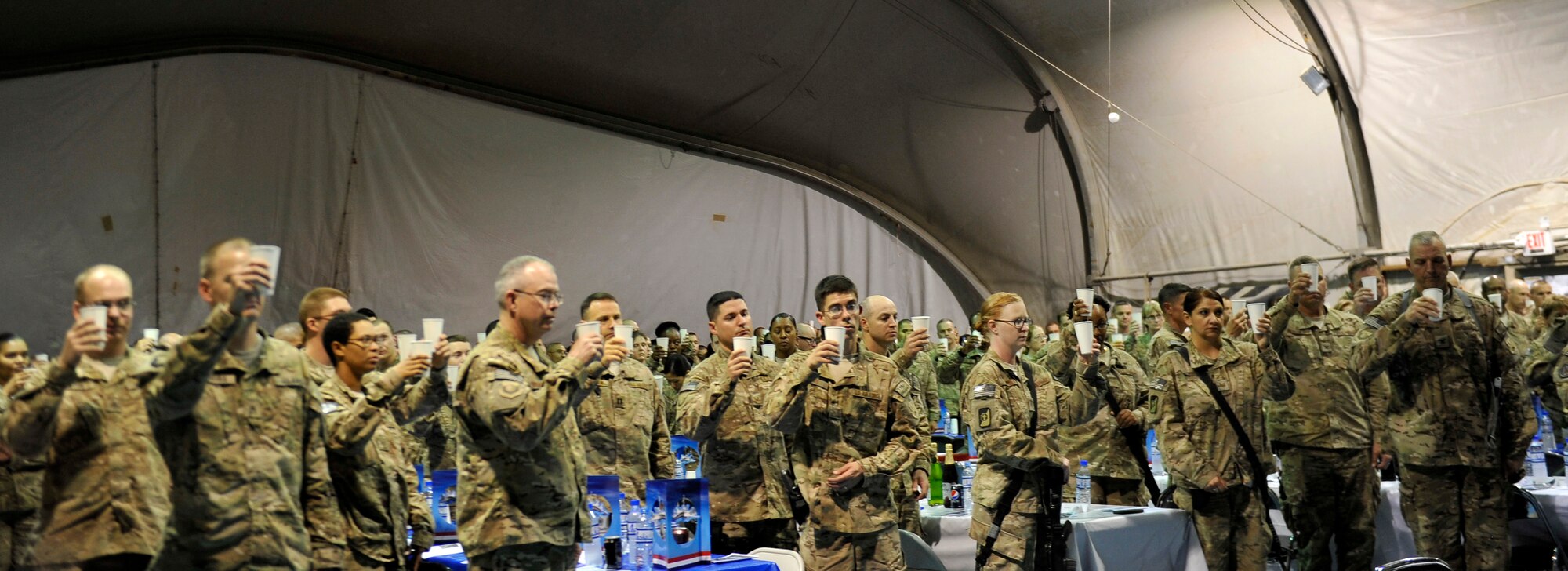 More than 300 service members gathered on Bagram Airfield, Afghanistan, Sept. 18, to celebrate the Air Force's 66th Birthday. The event included dinner, a cake cutting by the youngest Airmen here and a speech by the 455th Command Chief, CMSgt Kenneth Lindsey. (U.S. Air Force photos/ Staff Sgt. Stephenie Wade) 