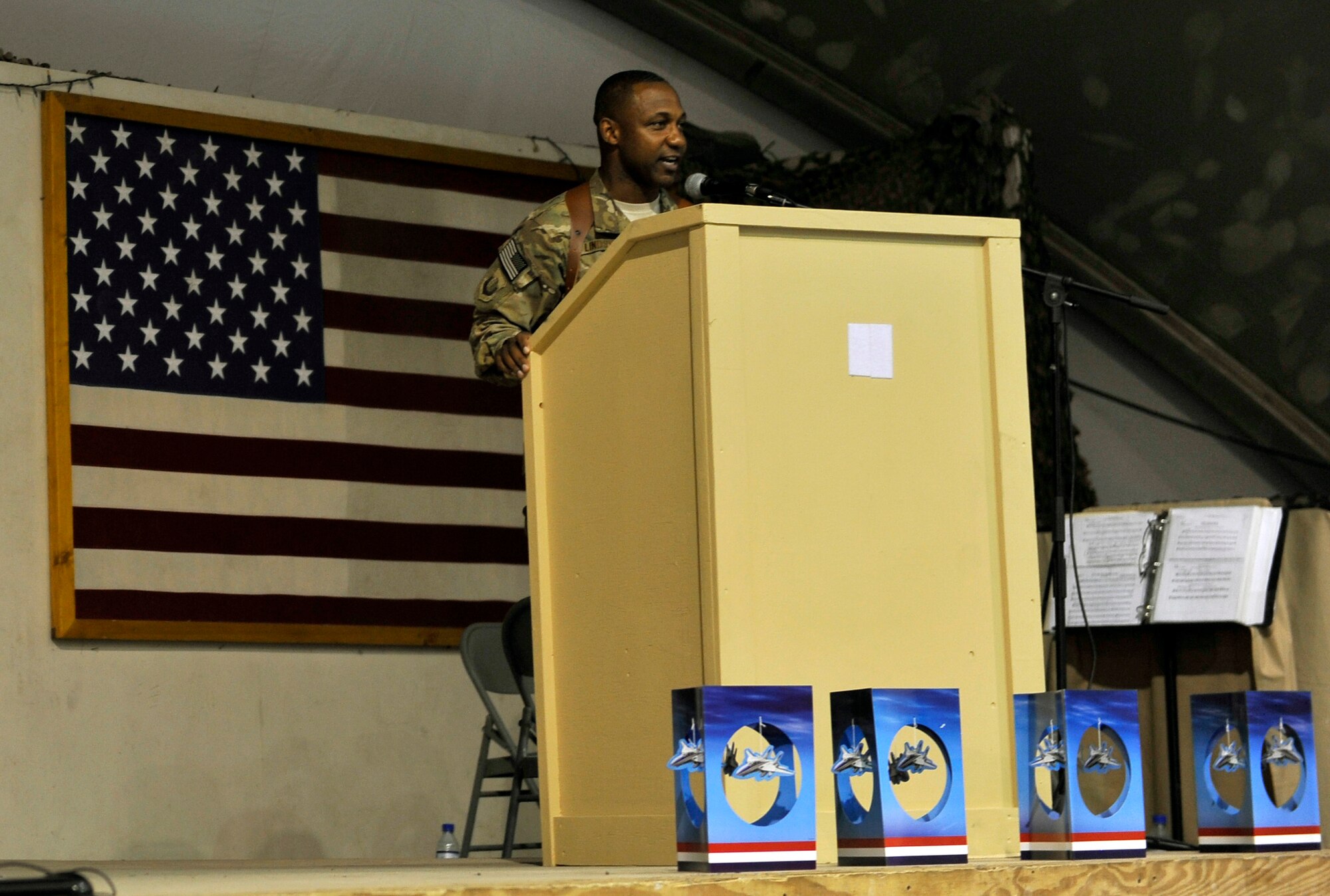 More than 300 service members gathered on Bagram Airfield, Afghanistan, Sept. 18, to celebrate the Air Force's 66th Birthday. The event included dinner, a cake cutting by the youngest Airmen here and a speech by the 455th Command Chief, CMSgt Kenneth Lindsey. (U.S. Air Force photo/ Staff Sgt. Stephenie Wade) 