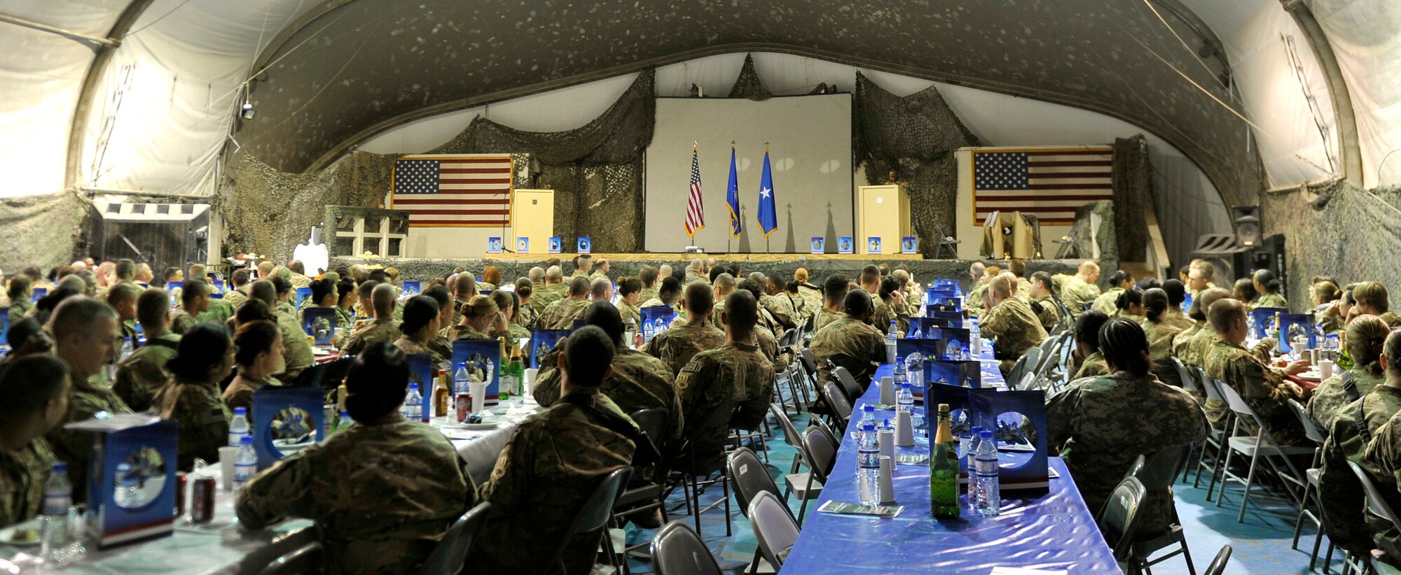 More than 300 service members gathered on Bagram Airfield, Afghanistan, Sept. 18, to celebrate the Air Force's 66th Birthday. The event included dinner, a cake cutting by the youngest Airmen here and a speech by the 455th Command Chief, CMSgt Kenneth Lindsey. (U.S. Air Force photo/ Staff Sgt. Stephenie Wade) 