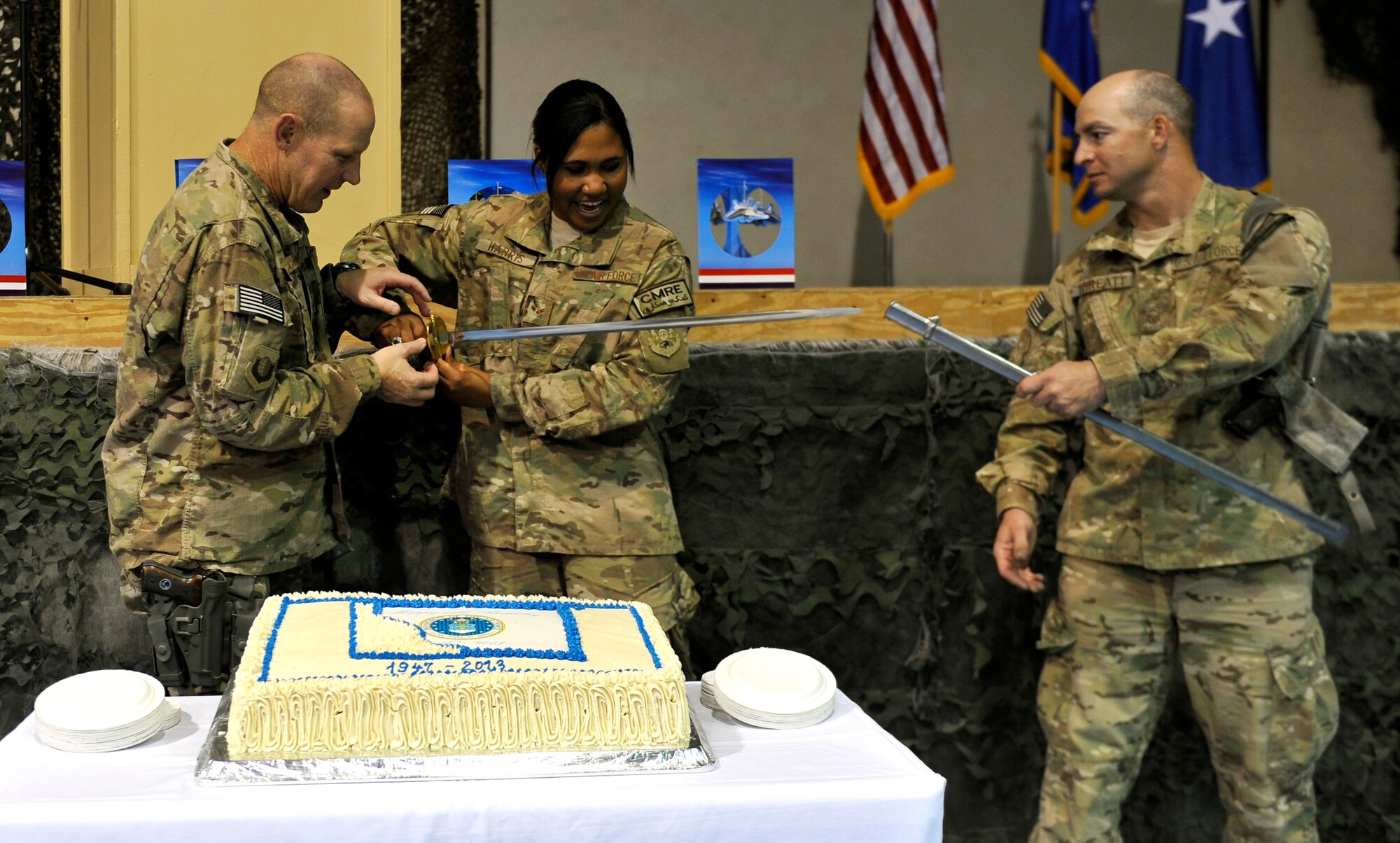 More than 300 service members gathered on Bagram Airfield, Afghanistan, Sept. 18, to celebrate the Air Force's 66th Birthday. The event included dinner, a cake cutting by the youngest Airmen here and a speech by the 455th Command Chief, CMSgt Kenneth Lindsey. (U.S. Air Force photo/ Staff Sgt. Stephenie Wade) 