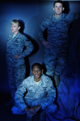 Airman 1st Class Caleb Spataro, 35th Fighter Squadron aviation resource manager, top, Staff Sgt. Brandi Watson, 35th FS Intelligence NCO in-charge, middle, and Airman 1st Class Jarod Dawson, 80th FS aviation resource manager, pose for a photo at Kunsan Air Base, Republic of Korea, Sept. 19, 2013. All three were chosen as Kunsan’s Pride of the Pack for saving the life of a drowning man at a local beach. (U.S. Air Force photo by Senior Airman Armando A. Schwier-Morales/ Released)