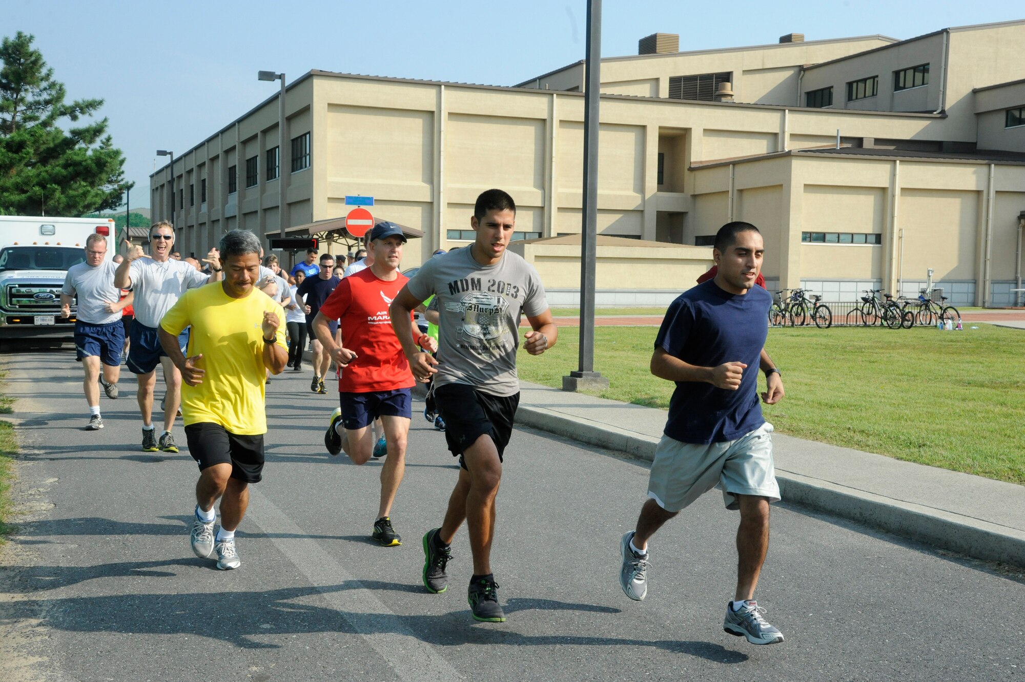 Wolf Pack Airmen start the Prisoner of War and Missing in Action 5K Run at Kunsan Air Base, Republic of Korea, Sept. 19, 2013. The 5K run was one of several events during the week designated to honor prisoners of war and those missing in action. (U.S. Air Force photo by Staff Sgt. Jessica Haas/Released)