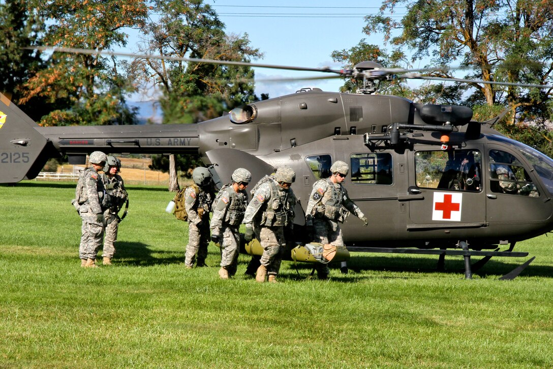U.S. Army and Japanese Ground SelfDefense Force medics transport a