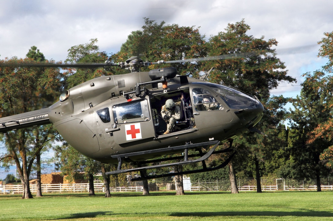 A U.S. Army UH-72 Lakota helicopter lands to pick up a simulated casualty during a joint medical training exercise on Yakima Training Center on Joint Base Lewis-McChord, Wash., Sept. 17, 2013.