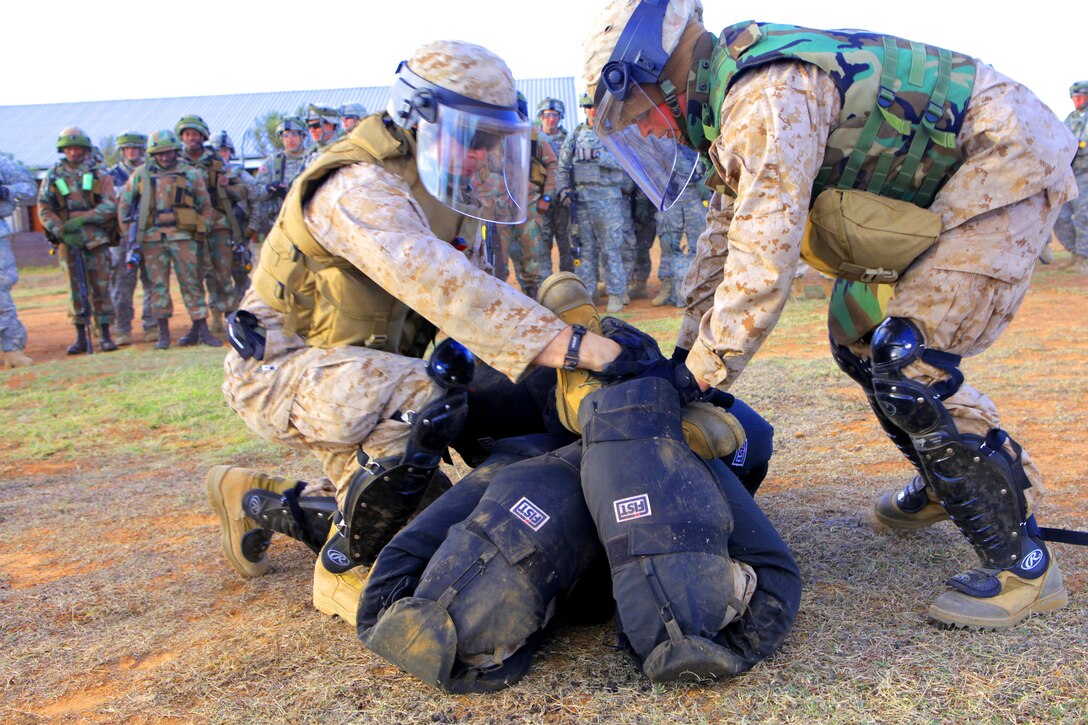 Marines from 4th Law Enforcement Battalion supported Exercise Shared Accord 13, a multilateral training engagement with more than 700 servicemembers from the U.S. Marines, Army, Navy, and Air Force along with more than 3,000 South African National Defense Force counterparts in Port Elizabeth, South Africa, from July 24 - Aug. 7.