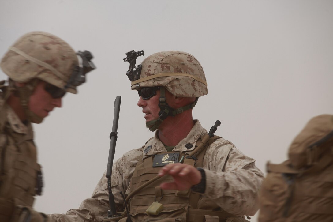 First Sgt. Jody Armentrout, Fox Company first sergeant, 2nd Battalion, 3rd Marine Regiment, counts his Marines as they load into CH-53E Super Stallion helicopters, Sept. 11, 2013, while conducting the air assault course as part of the Intergrated Training Exercise at Marine Corps Air Ground Combat Center, Calif. (U.S. Marine Corps photo by Cpl. Sarah Dietz)
