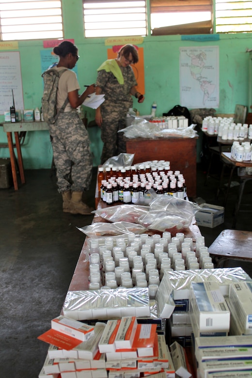 Members of Joint Task Force-Bravo's Medical Element prepare medical supplies during a Medical Readiness Training Exercise (MEDRETE) in Honduras, Sept. 19, 2013.  During the exercise, JTF-Bravo members provided medical care to more than 800 individuals in the Gracias a Dios region of Honduras.  (Photo by U.S. Army Spc. Patrick Rawlings)
