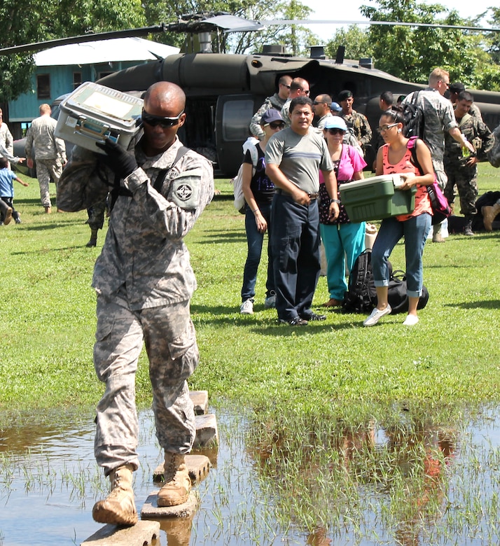 Members of Joint Task Force-Bravo's Medical Element offload medical supplies during a Medical Readiness Training Exercise (MEDRETE) in Honduras, Sept. 19, 2013.  During the exercise, JTF-Bravo members provided medical care to more than 800 individuals in the Gracias a Dios region of Honduras.  (Photo by U.S. Army Spc. Patrick Rawlings)