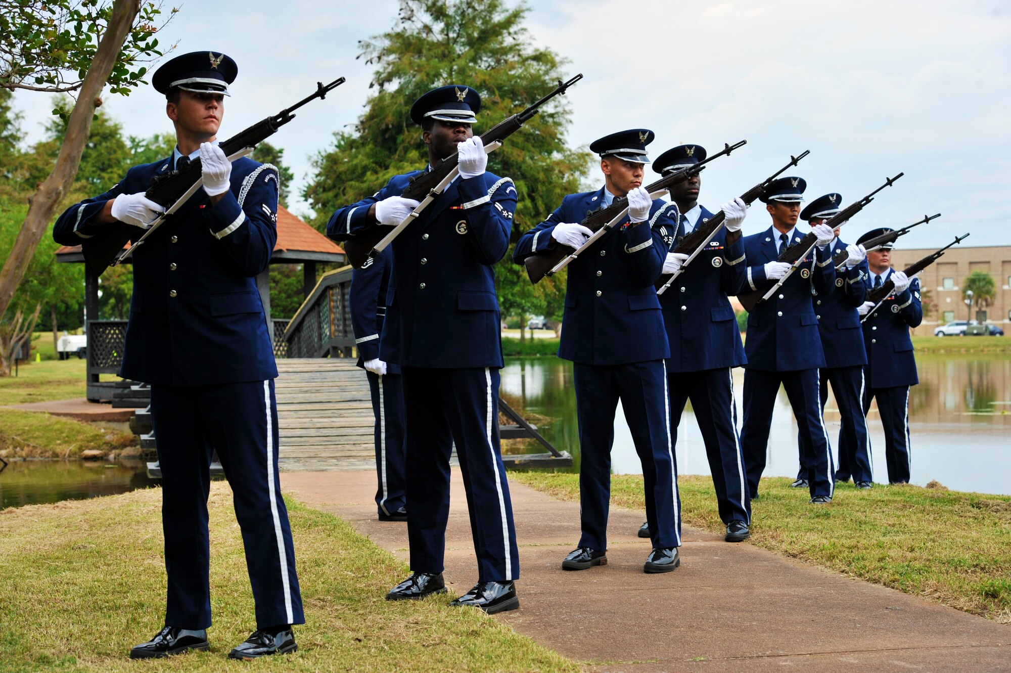 The Shaw Air Force Base Honor Guard fire off a 21-gun salute during the POW/MIA Remembrance Day ceremony Sept. 20, 2013, at Shaw AFB, S.C. The event was held in honor of all the U.S. service members who have been held captive or gone missing during times of war. (U.S. Air Force photo by Airman 1st Class Jonathan Bass/Released)