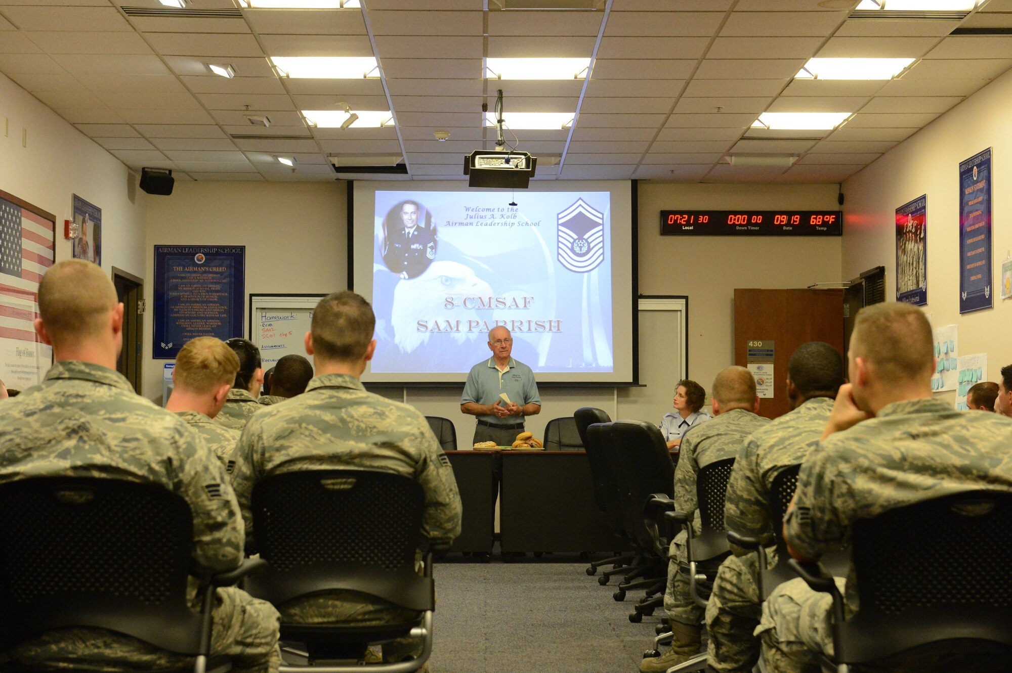 Sam Parish, 8th Chief Master Sgt. of the Air Force, briefs Airmen at the Julius A. Kolb Airman Leadership School about the importance of integrity, Sept. 9, 2013, at Joint Base Lewis-McChord, Wash. Prior to retiring from the Air Force in 1986, Parish served more than 30 year. (U.S. Air Force photo/Airman 1st Class Jacob Jimenez) 