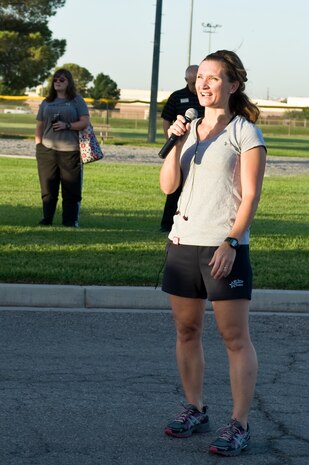 Lt. Col. Tammy Johnson, 99th Force Support Squadron commander, speaks before the Air Force’s 66th Birthday 5 kilometer run Sept. 18, 2013, at Nellis Air Force Base, Nev. The run is held to honor those who serve and who have served in our nation's youngest branch of service. (U.S. Air Force photo by Senior Airman Matthew Lancaster)