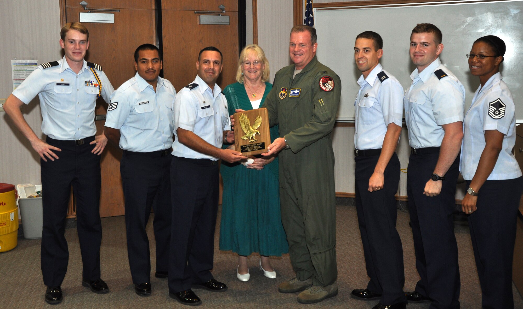 SAN ANGELO, Texas – Col. Mark Mattison, Air Force ROTC Southwest Region Commander, presents Air Force ROTC Detachment 847 with the 2013 High Flight award as the best medium-size detachment in the Southwest Region at Angelo State University Sept. 18. The award recognizes the best Air Force ROTC detachment within a geographic region of the U.S. based on its education program, cadet activities, university and public interactions, community service projects and cadet accomplishments. (U.S. Air Force photo/ Airman 1st Class Joshua Edwards)