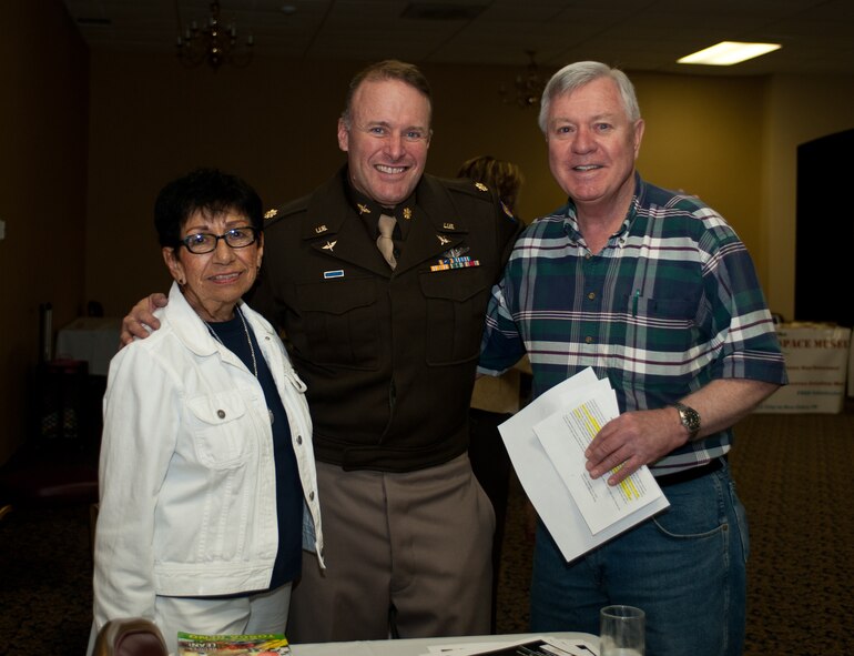 Bob Liebman, Ellsworth Heritage Foundation board member and volunteer, and Mary Piper, Military Officers Association of America representative, stand with Donald Floden, Air Force and Army retiree, during Retiree Appreciation Day in the Dakota’s Club at Ellsworth Air Force Base, S.D., Sept. 13, 2013. In addition to the luncheon, the event provided attendees with the latest information on benefits and programs available to retirees and their families. (U.S. Air Force photo by Airman 1st Class Alystria Maurer/Released)