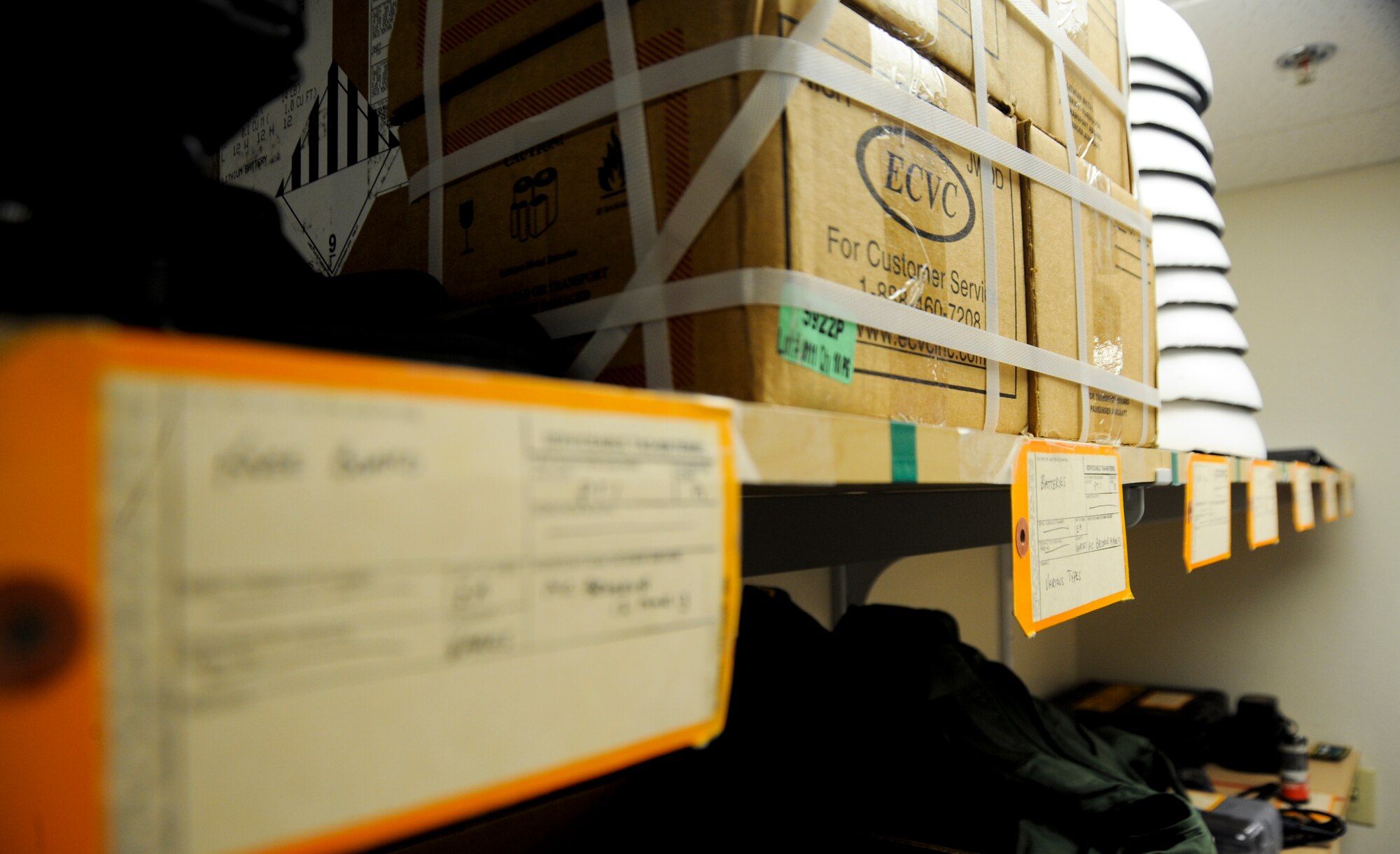 Equipment waits to be used with the inspection tags underneath to let members of the 358th Fighter Squadron know that the gear is serviceable at Davis-Monthan Air Force Base, Ariz., Sept. 19, 2013. The aircrew flight equipment technicians also are responsible for ensuring all emergency safety equipment, such as parachutes and survival kits, are mission ready. (U.S. Air Force photo by Airman 1st Class Justin Veazie/Released)