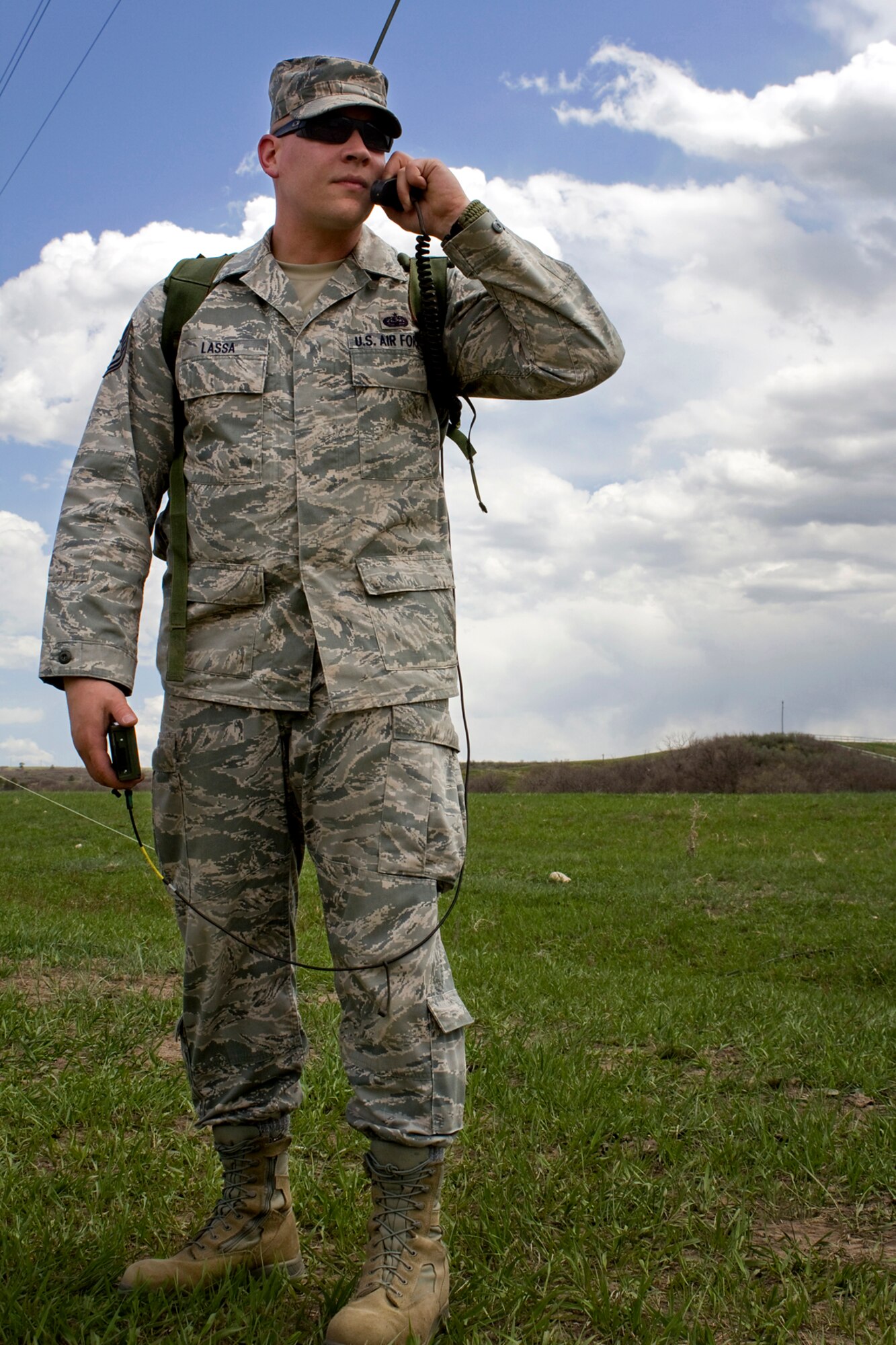 Tech. Sgt. Jeff Lassa, 434th Communications Squadron transmission systems supervisor, uses a man-portable PRC-150 radio with a joint incident site communications capability system during Vital Connection 2013 at the Highlands Ranch Law Enforcement Training Facility in Littleton, Colo., May 16, 2013.
Vital Connection 2013 is a major communications exercise sponsored by U.S. Northern Command in conjunction with the Colorado Division of Homeland Security & Emergency Management, which included various participants from state, federal and local agencies. (U.S. Air Force photo/1st Lt. Dustin Schimp) 
