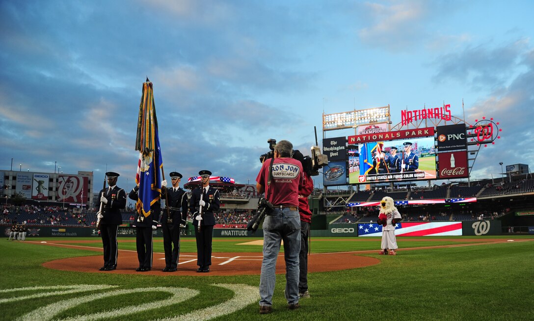 The United States Air Force Color Guard and Drill Team perform at Nationals Park before the Washington Nationals versus Miami Marlins baseball game at Nationals Park, Washington, D.C., Sept. 19, 2013. Airmen from the National Capitol Region participated in various pre-game events and ceremonies in honor of Air Force Night. (U.S. Air Force photo/Airman 1st Class Erin O’Shea) 