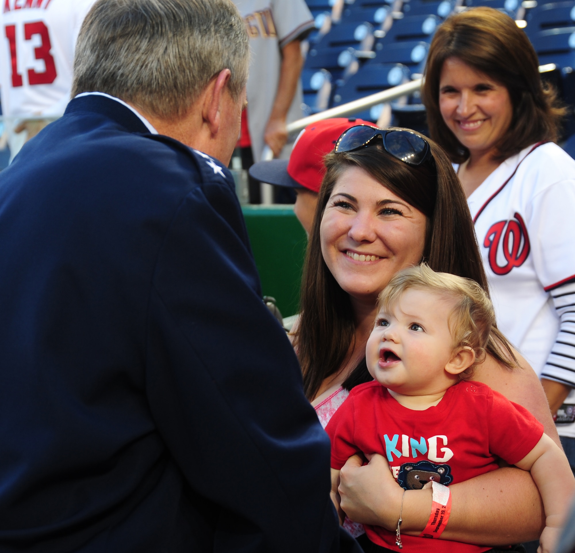 General Mark Welsh, Chief of Staff of the Air Force, engages with fans before the Washington Nationals versus Miami Marlins baseball game at Nationals Park, Washington, D.C., Sept. 19, 2013. Welsh presented the game ball for the first pitch. (U.S. Air Force photo/Airman 1st Class Erin O’Shea) 