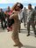 Maj. Jon Magee, a C-130 pilot with the 731st Airlift Squadron greets his daughter Alyssa after landing Sept. 18, 2013 at Peterson Air Force Base, Colo. Magee had just returned from a deployment to Southwest Asia along with approximately 150 other members of the Air Force Reserve Command’s 302nd Airlift Wing.  (U.S. Air Force photo/Rob Bussard)