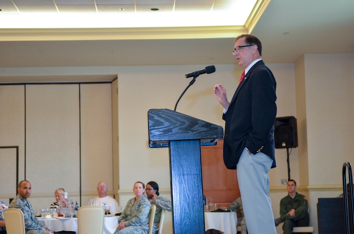 Retired Air Force Lt. Col. Thomas Hanton speaks at the Prisoner of War/Missing in Action Luncheon Sept. 20, 2013, at Joint Base Charleston – Air Base, S.C. Hanson was taken as a prisoner in North Vietnam after his F-4 Phantom was shot down during a search and rescue mission June 27, 1972, and held until his release on March 28, 1973. (U.S. Air Force photo/Airman 1st Class Michael Reeves)