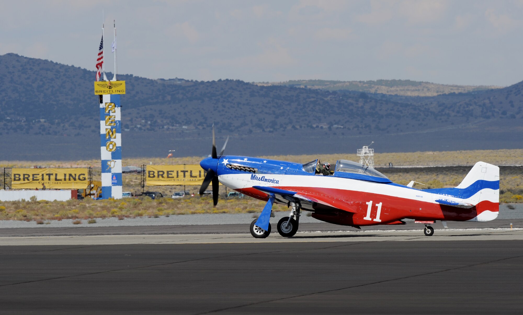 A vintage P-51 Mustang fighter aircraft taxies the runway at Stead Airport, Reno, Nev., Sept. 14, 2013. The air races have been held annually since 1963. (U.S. Air Force photo by Staff Sgt. Robert M. Trujillo/Released) 