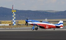 A vintage P-51 Mustang fighter aircraft taxies the runway at Stead Airport, Reno, Nev., Sept. 14, 2013. The air races have been held annually since 1963. (U.S. Air Force photo by Staff Sgt. Robert M. Trujillo/Released) 