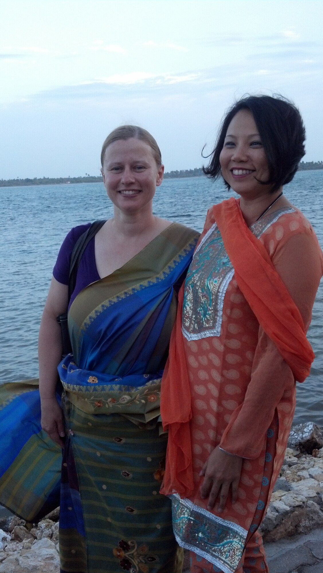 Dr. Erika Petrik, a family pratice doctor from Hawaii and Lt. Col. Thuy Tran wear some of the traditional clothing during the cultural celebration as part of the Pacific Angel Mission, Jaffna Peninsula of Sri Lanka, July 28-Aug.18, 2013. (photo courtesy of Master Sgt. Dana Furnia, 142nd Fighter Wing Medical Group)