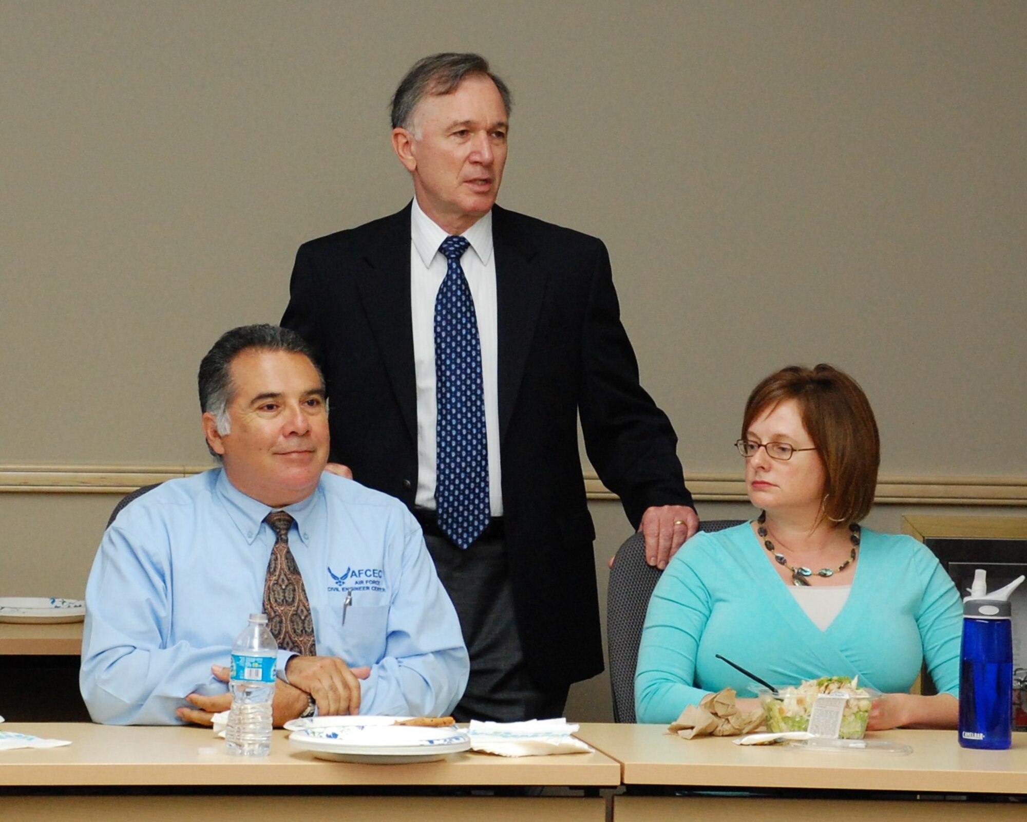 Gerald F. “Fred” Pease Jr. (center), Deputy Assistant Secretary of the Air Force for Environment, Safety and Occupational Health, discusses environmental issues with an Air Force Civil Engineer Center audience during his visit Sept. 16-20. Pease and his Air Staff delegation received a strategic overview of the centralized environmental programs AFCEC conducts for the Air Force. (U.S. Air Force Photo/Eric M. Grill)