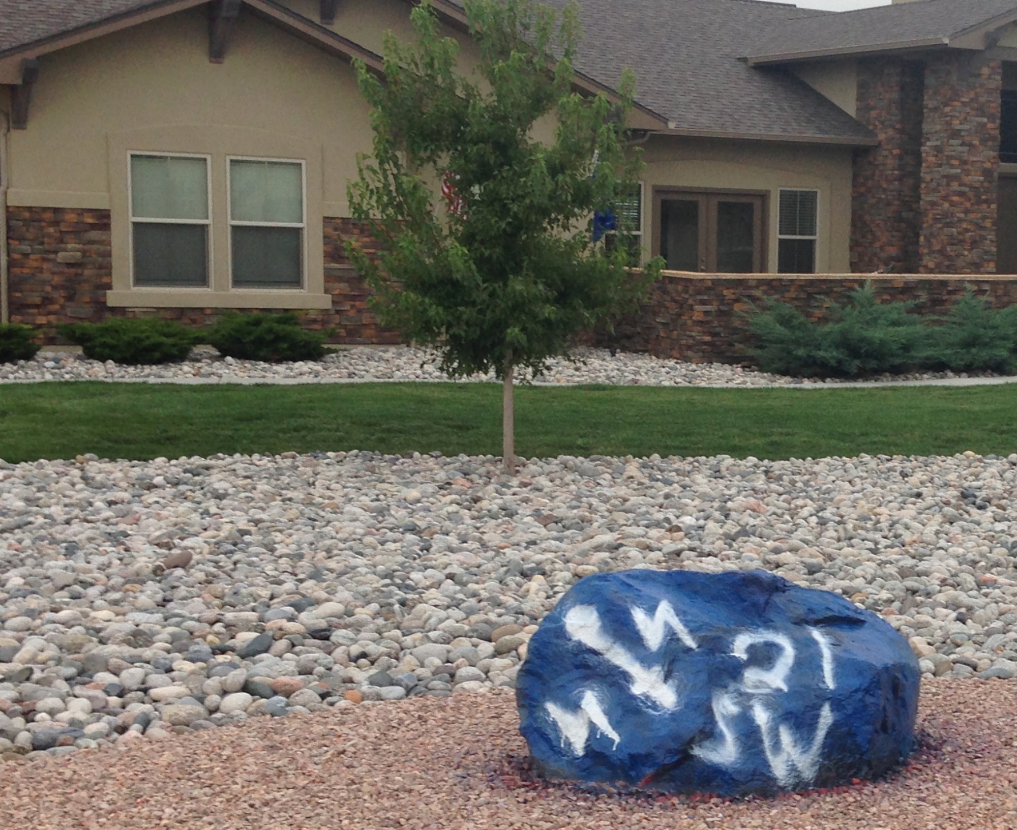 SCHRIEVER AIR FORCE BASE, Colo. – Knights from the 21st Space Wing successfully executed OPERATION SPIRIT ROCK Sept. 19, leaving the 21st SW mark on Schriever AFB in front of the home of Col. William Liquori, 50th SW commander. The mission was conducted in advance of the 21st SW vs. 50th SW softball game scheduled for 3 p.m. Sept. 20 at Peterson’s field 1. (U.S. Air Force photo)