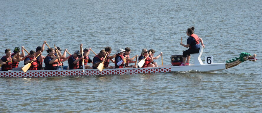 A team races towards the finish line during the 5th annual Red River Dragon Boat Festival in Shreveport/Bossier City, La., Sept. 14, 2013. Dragon boat races are typically 500 meters long, but they can also be 250, 1,000 and 2,000 meters as well as marathon races. (U.S. Air Force photo/Senior Airman Sean Martin)