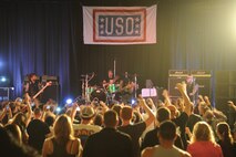 Drowning Pool band members perform for Team Malmstrom members at the base theater Sept. 13. Malmstrom Air Force Base was the band’s last stop during a three-base United Service Organization tour. (U.S. Air Force photo/Senior Airman Cortney Paxton)