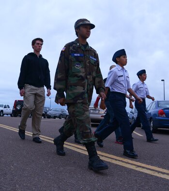 Malmstrom Air Force Base Civil Air Patrol Composite Squadron members practice marching during an open house at Holman Aviation in Great Falls, Mont., on Sept. 17. CAP members are between the ages of 12 and 17. Meetings are held Tuesday’s in the Honor Guard building 1918 from 6:30 to 9 p.m. (U.S. Air Force photo/Senior Airman Katrina Heikkinen)