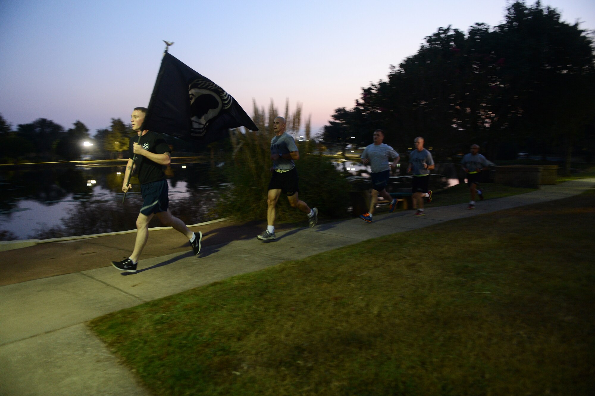 Team Shaw honors prisoners of war and those missing in action by holding a 24-hour run  at Shaw Air Force Base, S.C., Sept. 20, 2013. Many events are held year-round to honor the sacrifice and service of POWs and those MIA. (U.S. Air Force photo by Airman 1st Class Daniel Blackwell/Released)