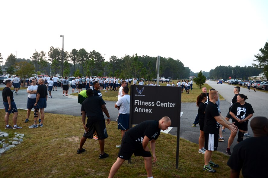 Airmen gather in preparation for a 5K and 10K run honoring prisoners of war and those missing in action, Shaw Air Force Base, S.C., Sept. 20, 2013. There are many events, year-round, that honor the sacrifice and service of POWs and those who are MIA. (U.S. Air Force photo by Airman 1st Class Daniel Blackwell/Released)
