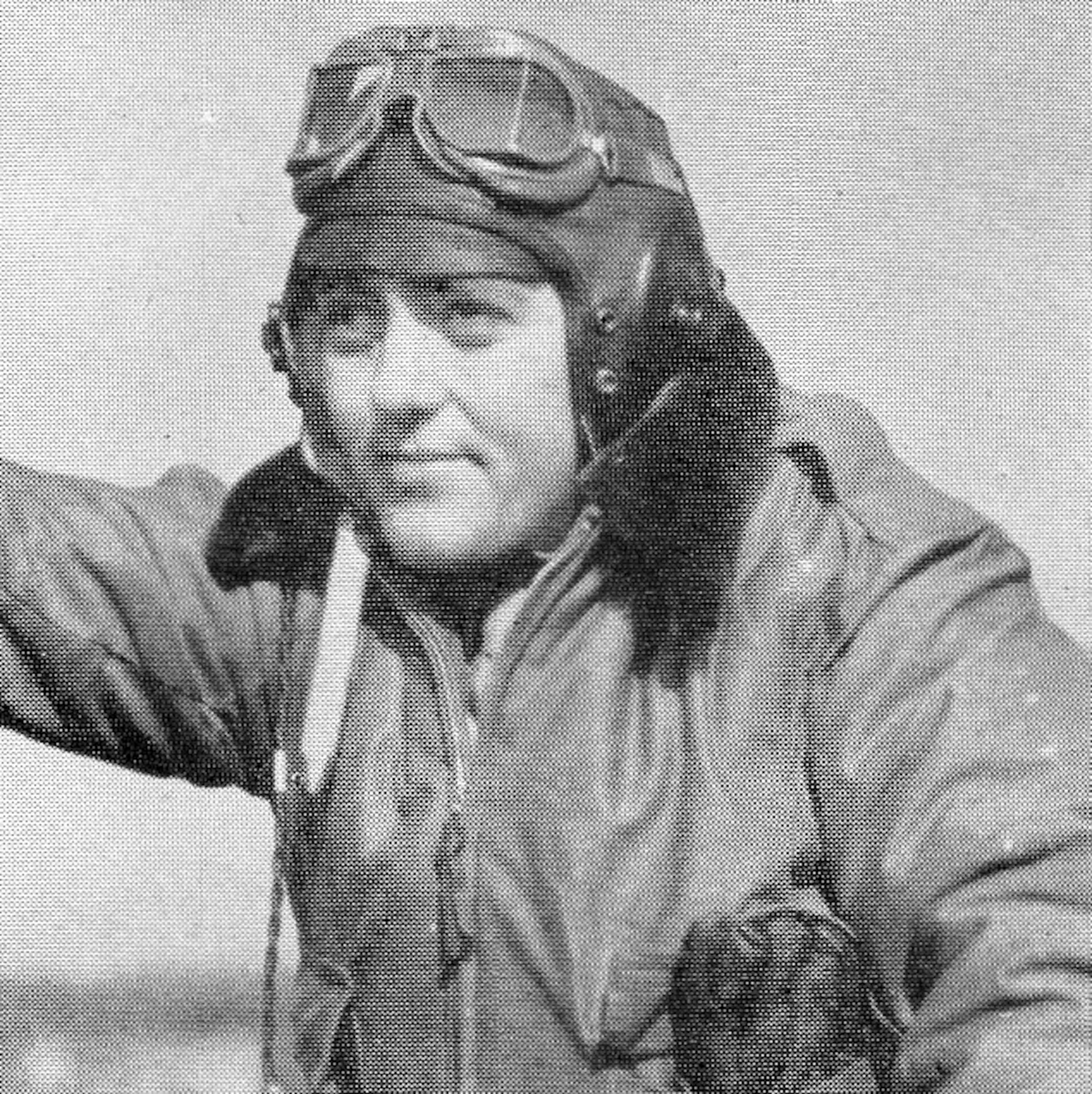 F/O Edwin S. Humphreys, 404th Fighter Squadron, struck a pose for the camera in his flying gear in this undated photograph.  He went MIA on 8 June 1944