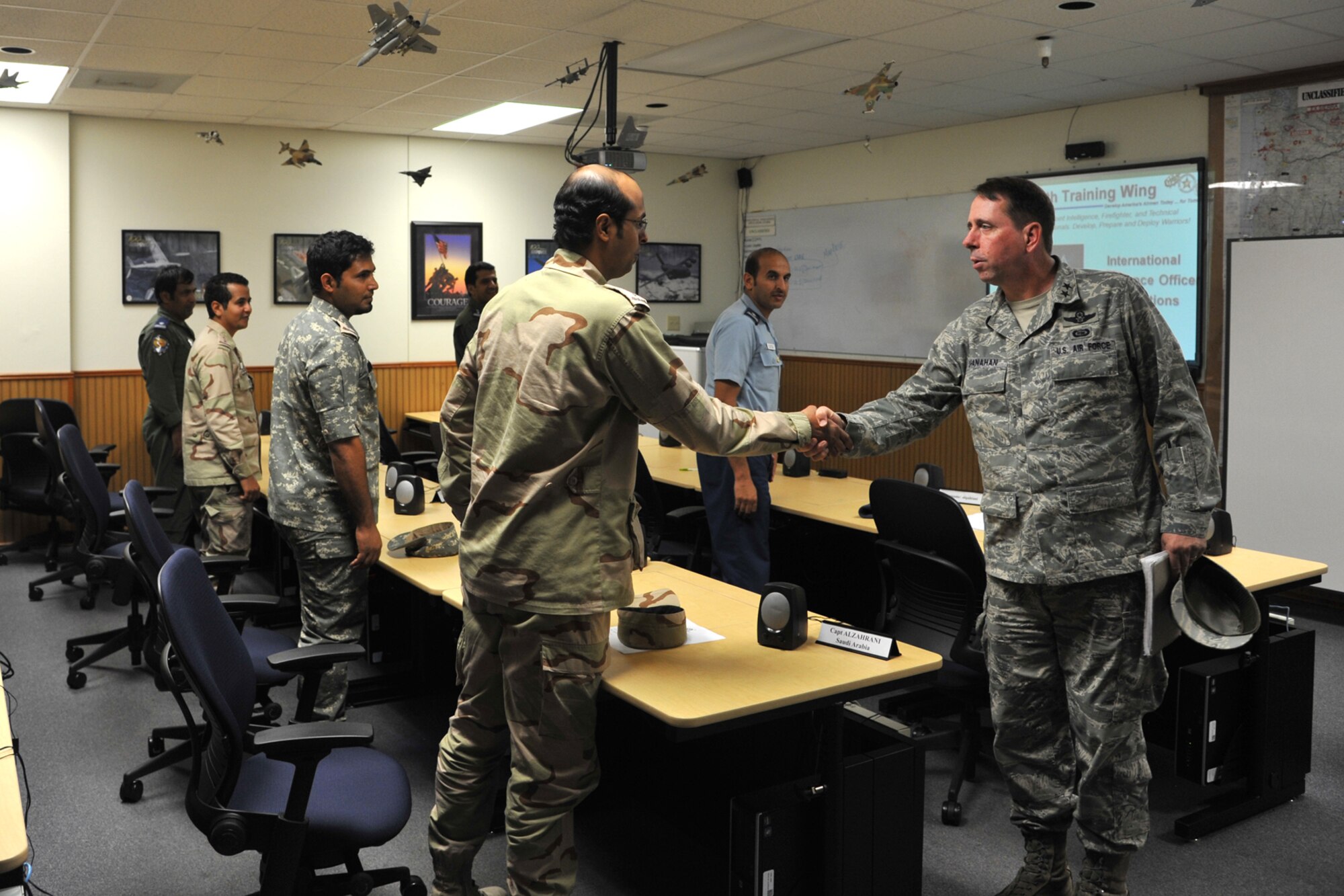 GOODFELLOW AIR FORCE BASE, Texas-- Maj. Gen. John Shanahan, Air Force Intelligence, Surveillance and Reconnaissance Agency Commander, greets international students during his visit Sept. 19. Shanahan’s visit included trips to the intelligence squadrons, Louis F. Garland Department of Defense Fire Academy and he also participated as the key note speaker of the 66th Goodfellow Air Force Ball. (U.S. Air Force photo/Senior Airman Michael Smith)