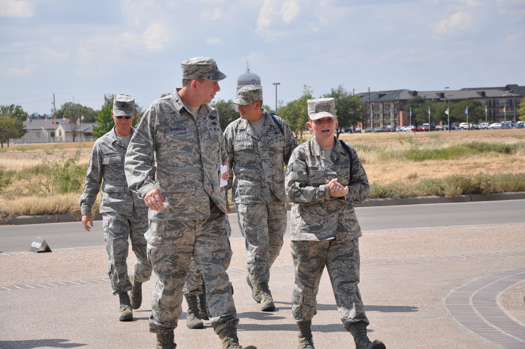 GOODFELLOW AIR FORCE BASE, Texas – Tech. Sgt. John Deese, 312th Training Squadron instructor, talks to Maj. Gen. John Shanahan, Air Force Intelligence, Surveillance and Reconnaissance Agency Commander, about the newest firefighter trainer at the Louis F. Garland Department of Defense Fire Academy, Sept. 13. The Fire Academy hosts roughly 15 advanced Fire Protection courses and a very intensive Fire Protection Apprentice Course. (U.S. Air Force photo/ Airman 1st Class Breonna Veal)
